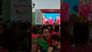 Portugal fans going crazy after Ronaldo's free-kick goal for 3-3 in Lisbon square.