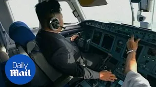Kim Jong Un flies plane in North Korean TV documentary - Daily Mail
