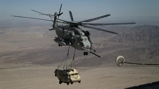 CH-53E Super Stallions Refuelling while Carrying 2 Humvee
