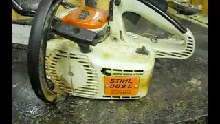 cleaning a chainsaw carburetor Stihl 009