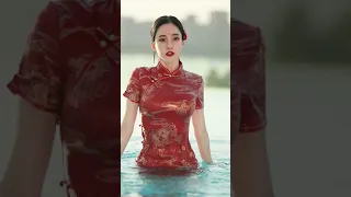 Oriental sexy beauty in cheongsam in the swimming pool