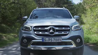 Mercedes-Benz X 350 d Diamond in Silver Metallic Driving in the country