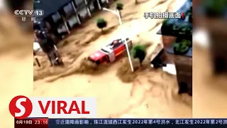 Fire engine gets swept away amid floods in southern China