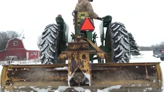 John Deere 3020 plowing snow on Christmas Day