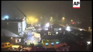 Rescue workers search for bodies in the rubble of a supermarket collapse in Latvia that killed dozen