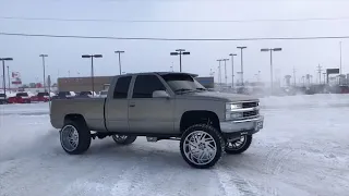 Obs Chevy in the snow. Lifted on 24x14’s and 35’s!