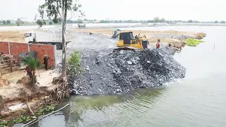 Watch The New Update Great Project Land Reclamation Truck Unloading Rock Into Water Dozer Pushing