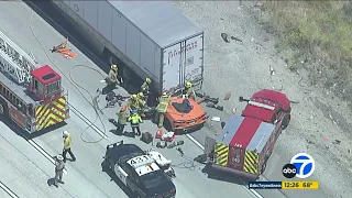 Corvette pinned under big rig after crash on 5 Freeway in Castaic