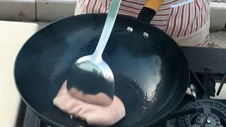 How to season a new cast iron wok on gas cooktop