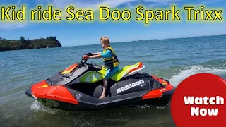 Kids riding Jet Ski Sea Doo Spark Trixx