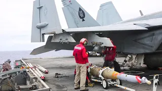 F/A-18E/F Super Hornets and F-35C Lightning II launch from the aircraft carrier USS Abraham Lincoln