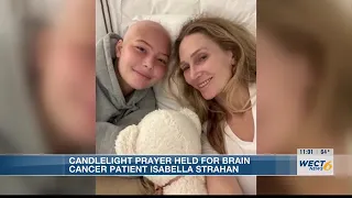 Hundreds attend candlelight prayer service for cancer patient Isabella Strahan