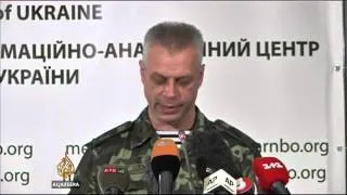 Ukraine says rebels shot down fighter jet