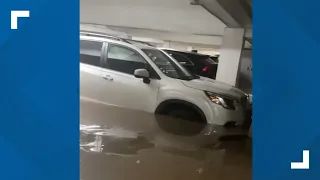 Standing water inside parking garage near Piedmont Park from flash flooding