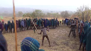 Donga Stick Fight in the Rain--Surma Tribe in Omo Valley of Ethiopia