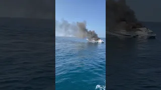 Two people abandon ship as boat catches on fire in Michigan