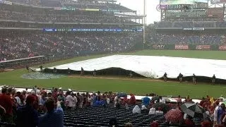 Grounds crew member is engulfed by the tarp