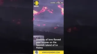 Lava streams past La Palma houses