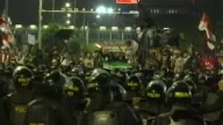 Police and Subianto supporters clash in Jakarta