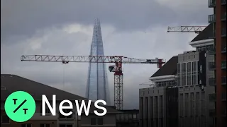 Police Scramble as Man Climbs Crane Near London's Shard Building