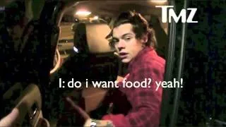 Harry Styles gives food to a paparazzi (January 2014)