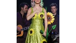 Wearing the full color spectrum between her outfit and her hair, Katy Perry performs in China.