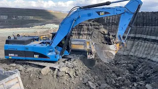 Caterpillar 345C Excavator Loading Trucks