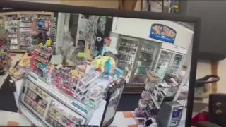Store clerk uses wasp spray to fight off armed robber