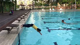 4 years old swimming breaststroke at 50 meter pool