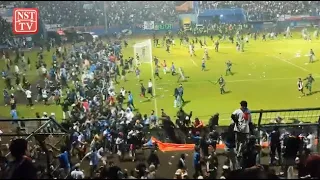 At least 127 dead after violence at football match in Indonesia
