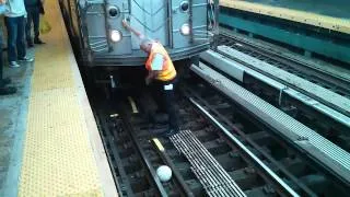 MTA Worker Retrieves Ball (7)