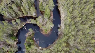 Paddling fun on Suomunjoki river at Patvinsuo national park in Finland