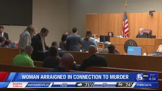 Woman arraigned in connection to murder