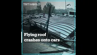 Roof blown off in high winds lands on cars