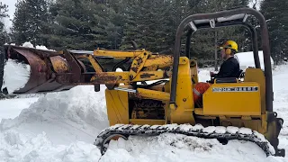 Bush Camp Snow Removal With JohnDeere 450