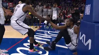 Kevin Durant completes AND-1 and celebrates with Kyrie Irving