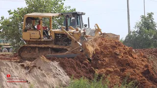 Power Bulldozer Heavy Moving Soils Working Dump Truck Unloading In Action