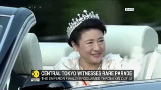 Japan imperial couple rides through Tokyo in grand enthronement parade