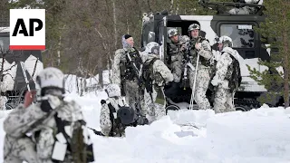 Sweden joins its new NATO allies in training across Norway's Arctic seas and snow