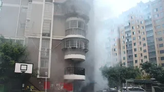 Residential building catches fire in east China