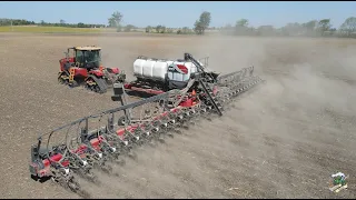 Versatile DT620 Tractor pulling a White 9900 32 Row Corn Planter