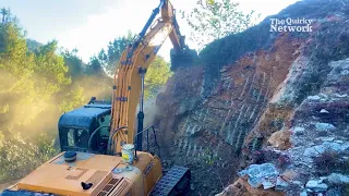 Excavator Operator Diligently Cutting Hill for Road Widening