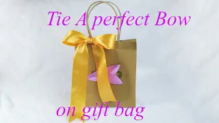 How to make a Bow | Ribbon bow | Bow making | Tie a ribbon on gift bag