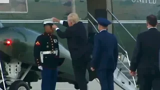 Trump Puts Marine's Hat Back On