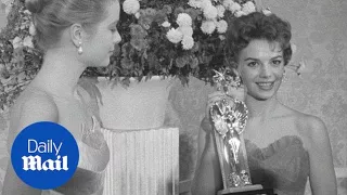 Natalie Wood accepting an award from Grace Kelly in 1955 - Daily Mail