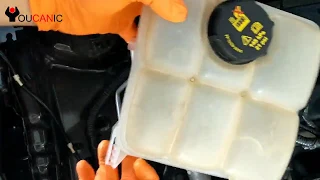 Step-by-Step Guide: How to Remove the Engine Coolant Reservoir on a Ford Focus 2012-2019