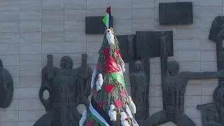Iraqis use Christmas tree to show solidarity with Gaza as conflict overshadows the holiday season