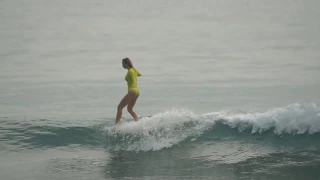 Surfing Bali Indonesia, longboard