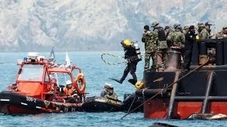 Divers Find Cabin Crammed with Bodies