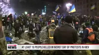 Violence escalates in Ukraine killing at least 18 people